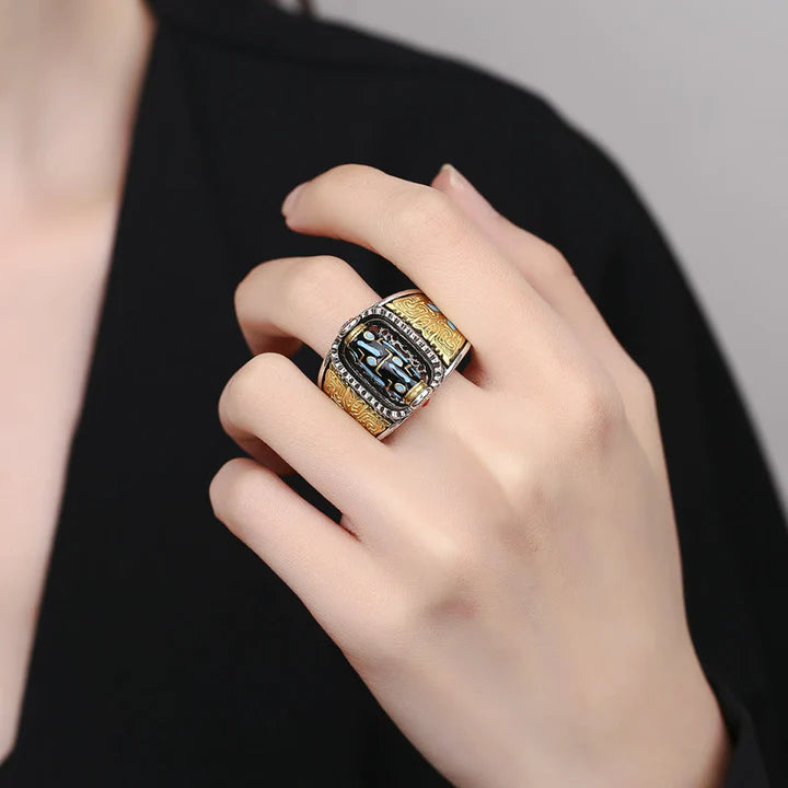 Anillo giratorio de bendiciones de riqueza de nueve ojos Dzi tibetano