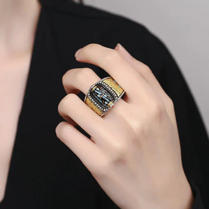 Anillo giratorio de bendiciones de riqueza de nueve ojos Dzi tibetano
