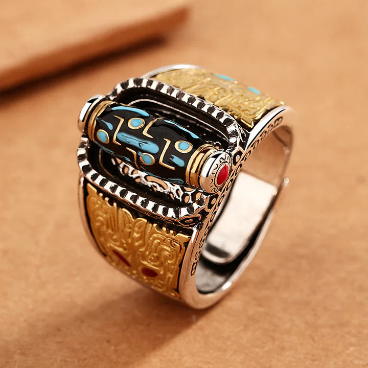 Anillo giratorio de bendiciones de riqueza de nueve ojos Dzi tibetano